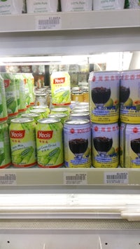 a display of canned vegetables in a grocery store